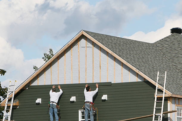 Professional Vinyl Siding technician working in Trafford, PA